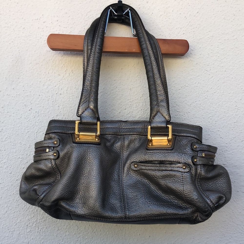 B. Makowsky silver metallic leather handbag with gold hardware